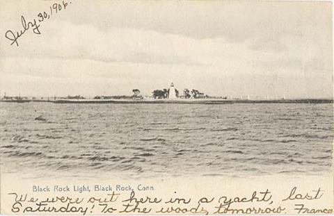 postcard of station in distance 