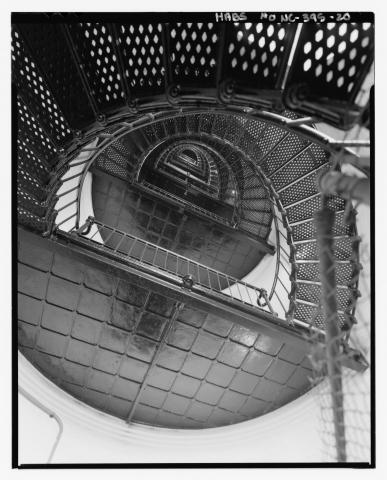 looking up staircase to landing