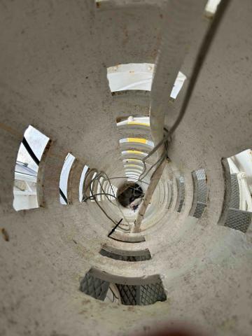 view inside clockwork weight tube