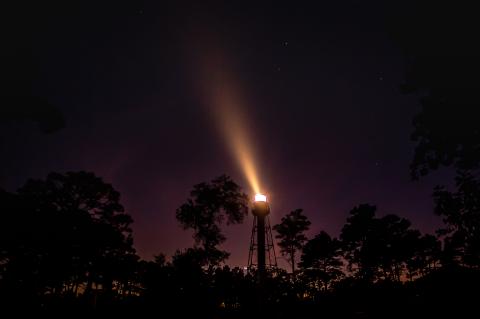 light from the lantern beams out in the dark