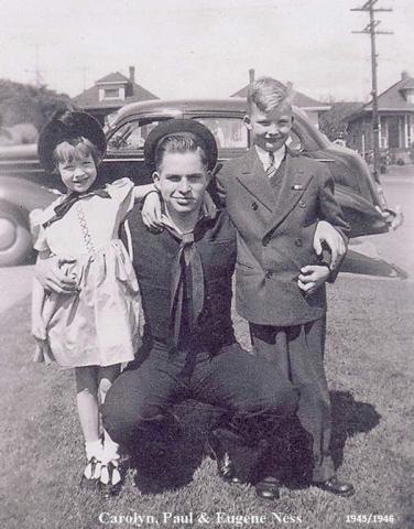 Paul J. Ness with siblings