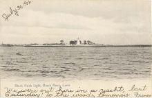 postcard of station in distance 