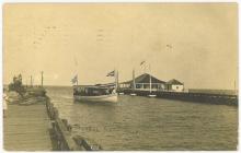 ship sails between piers
