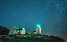 starry night behind the lighthouse 