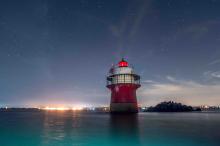 sparkplug lighthouse at night